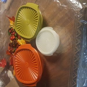 set of 3 Tupperware bowls with lids